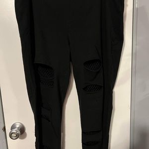 Torrid size 2 ripped fishnet leggings